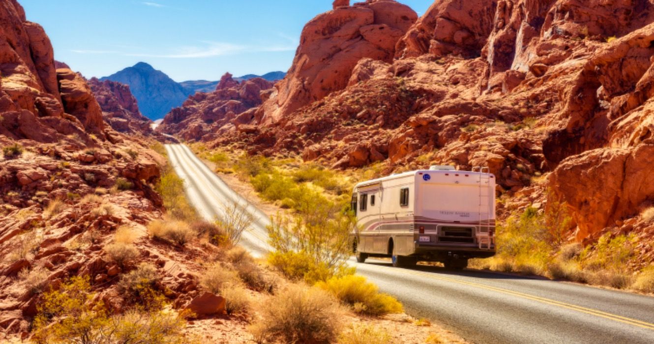 Motorhome trailer traveling on the road in Valley of Fire in Nevada