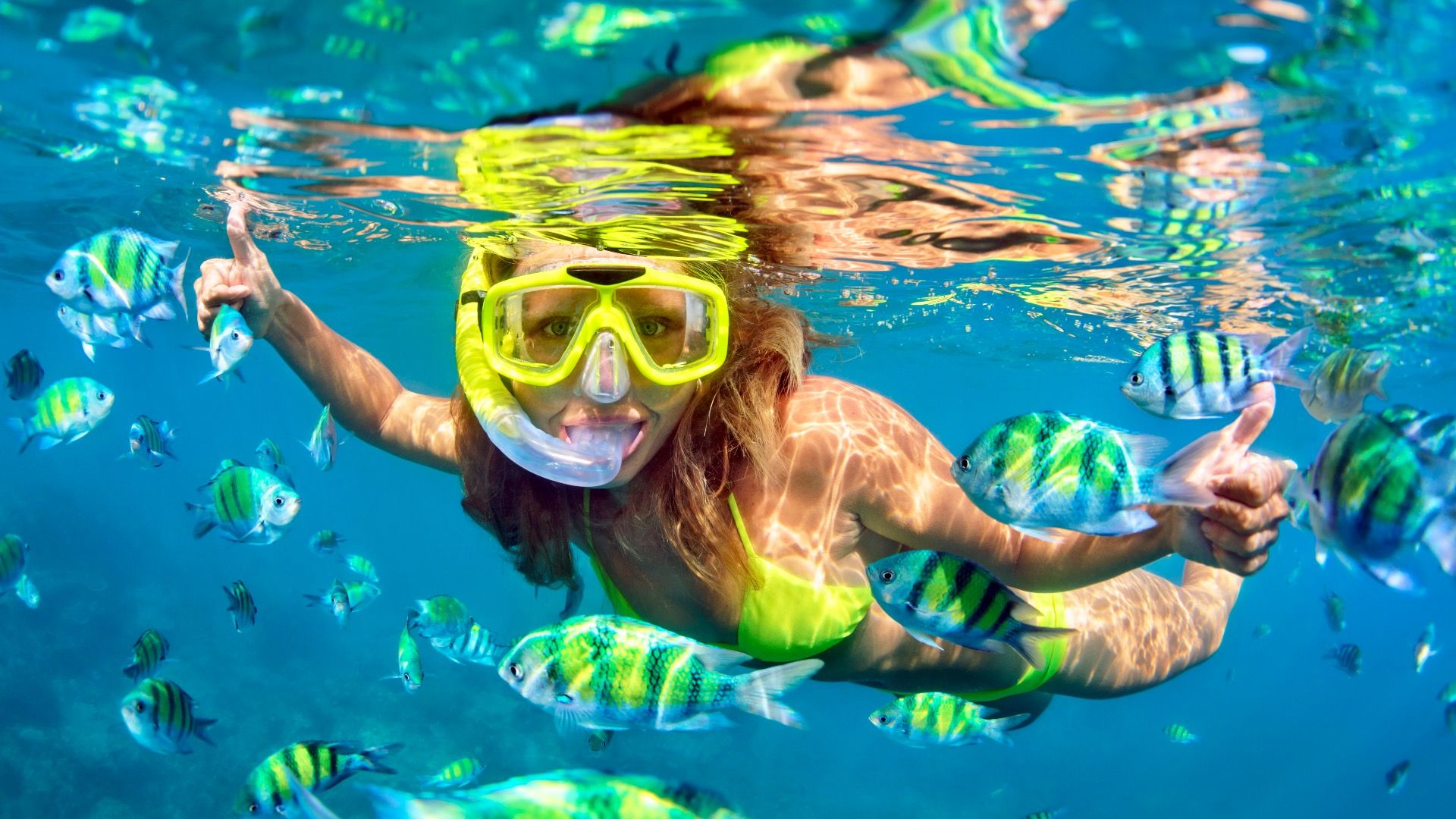 Girl snorkeling in the Caribbean 