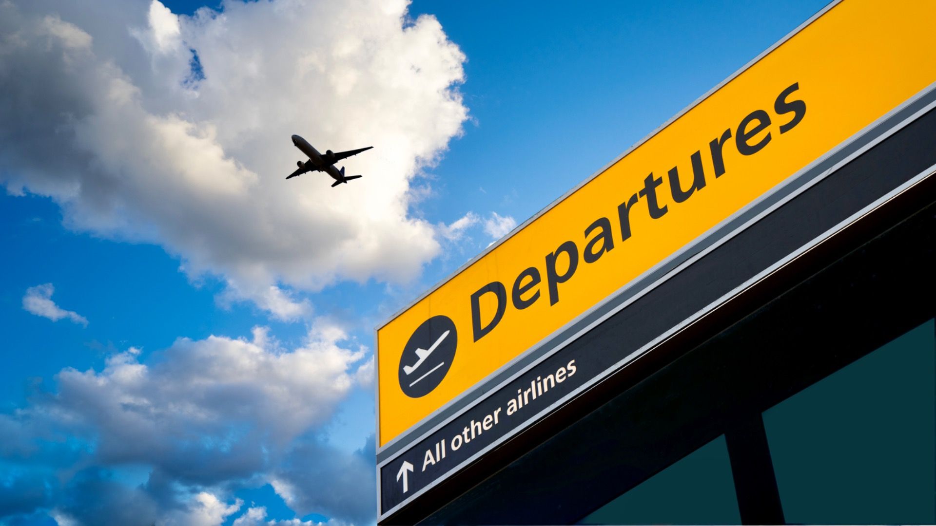 Airport Departure and Arrival sign at Heathrow, London