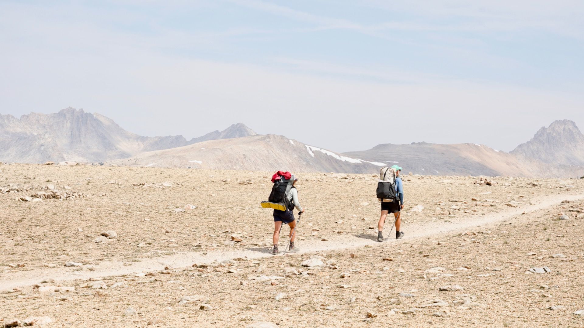 Hikers heading to Forester Pass Mountain Landscapes in the Sierra Nevada Range of California on the Pacific Crest Trail.