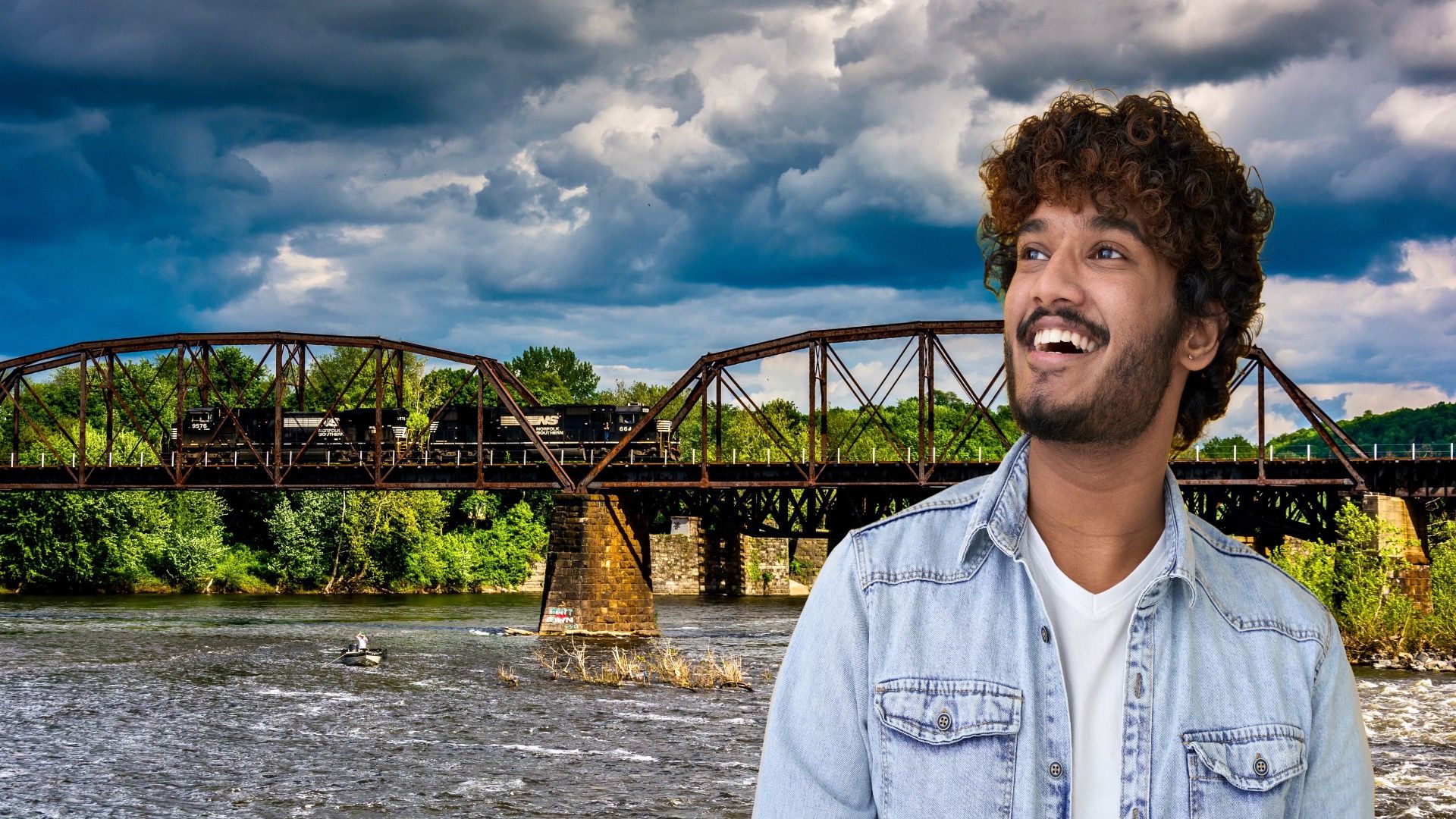 Storm clouds over a train bridge and the Delaware River in Easton, Pennsylvania.