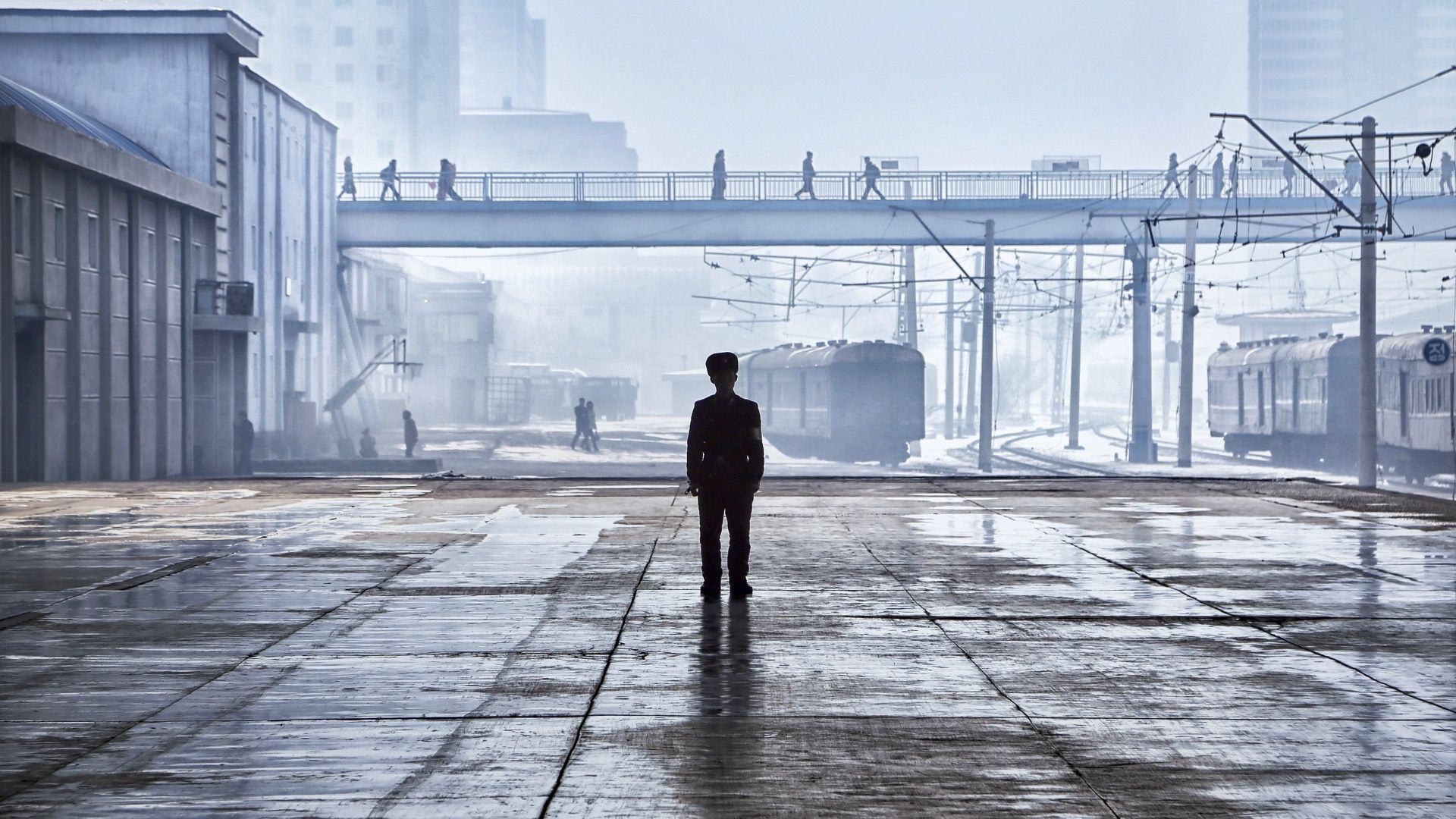 Pyongyang train station and soldiers standing guard in winter