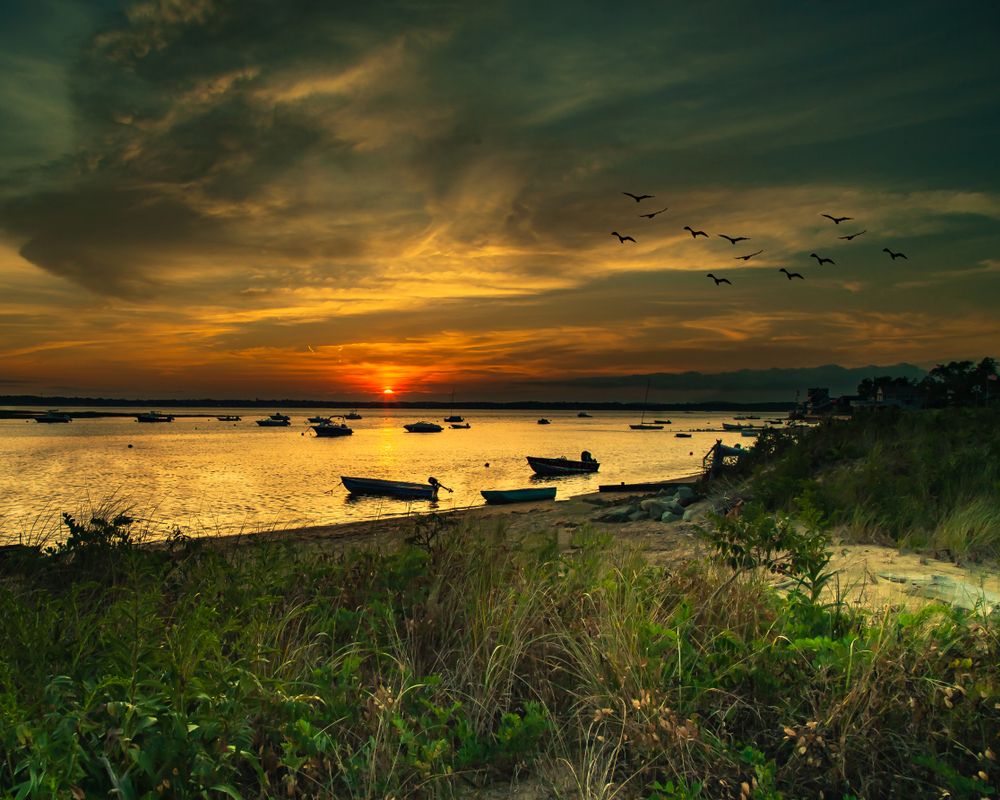 Sun setting over plum island Massachusetts, end of summer.