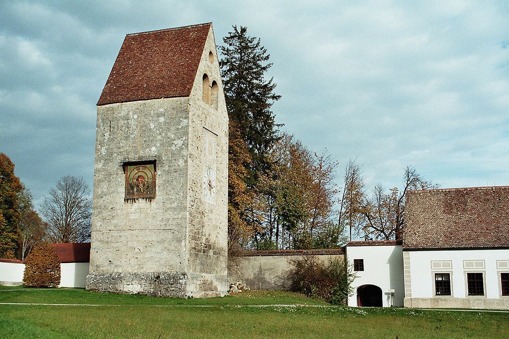 The old clock tower and cloister walls of Wessobrun Abbey, Bavaria, Germany.