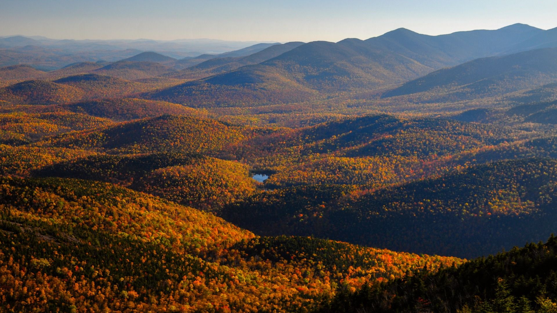 The view from Giant Mountain summit in Adirondack Forest Preserve, New York, NY, USA, with fall foliage in the autumn