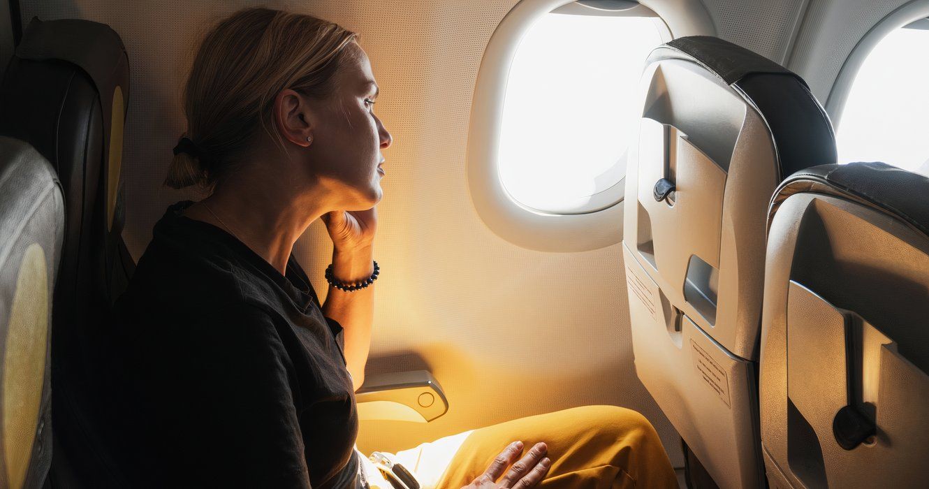 Female passenger on a plane