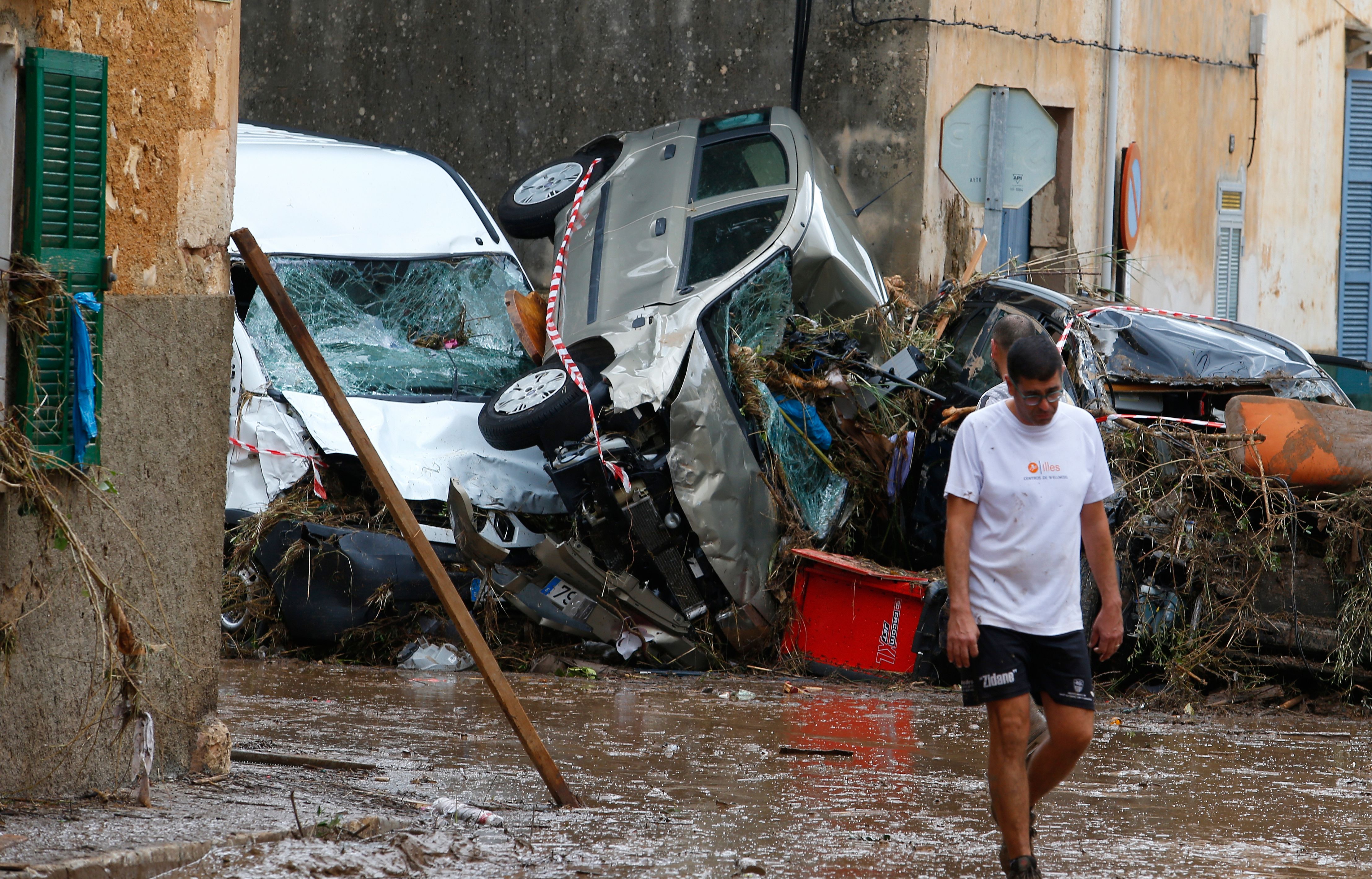 Crashed cars and debris on the streets after heavy flash floods in Mallorca, Spain