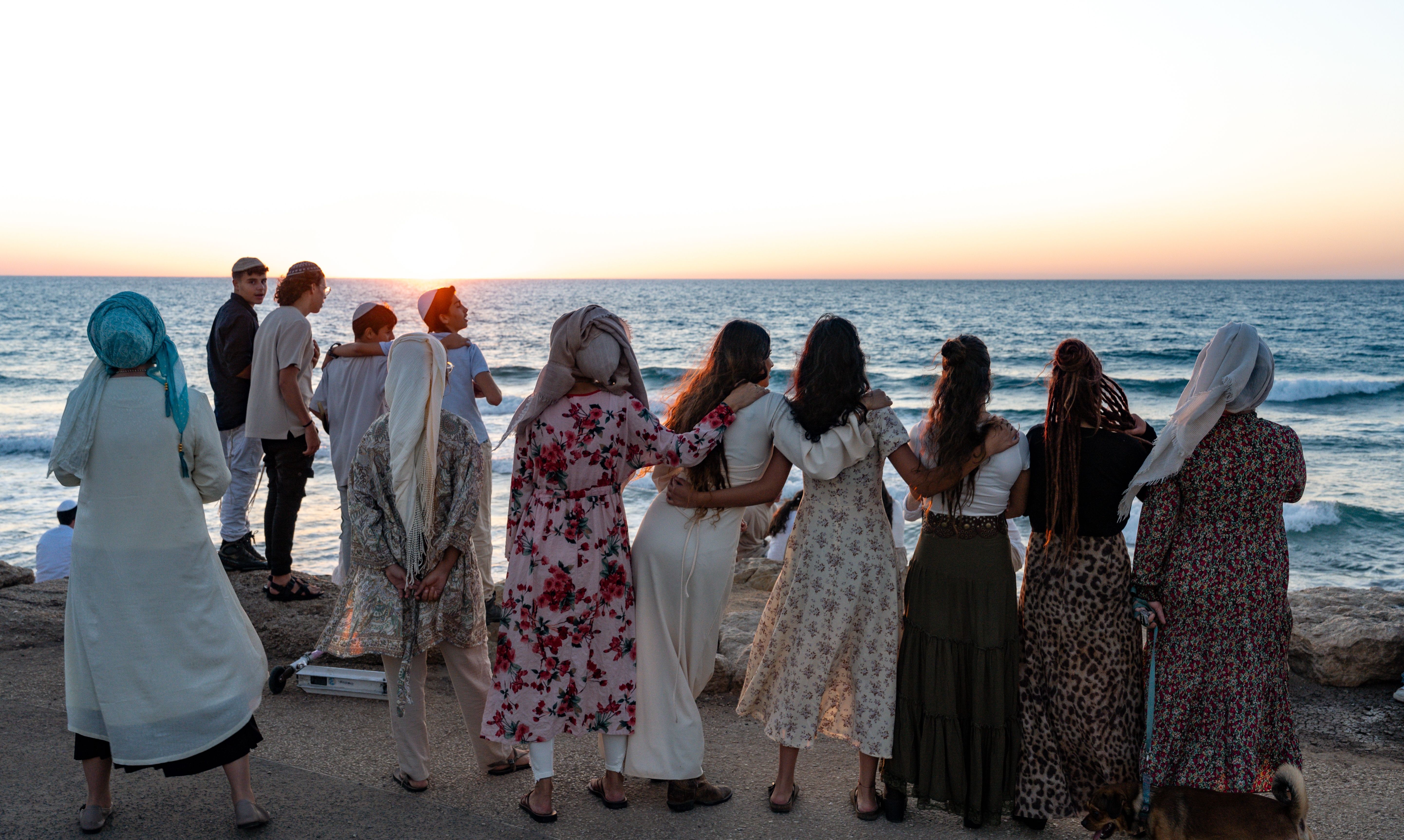 Jewish perform the Tashlich - Jewish prayer ceremony for Rosh Hashanah on the Tel Aviv Promenade