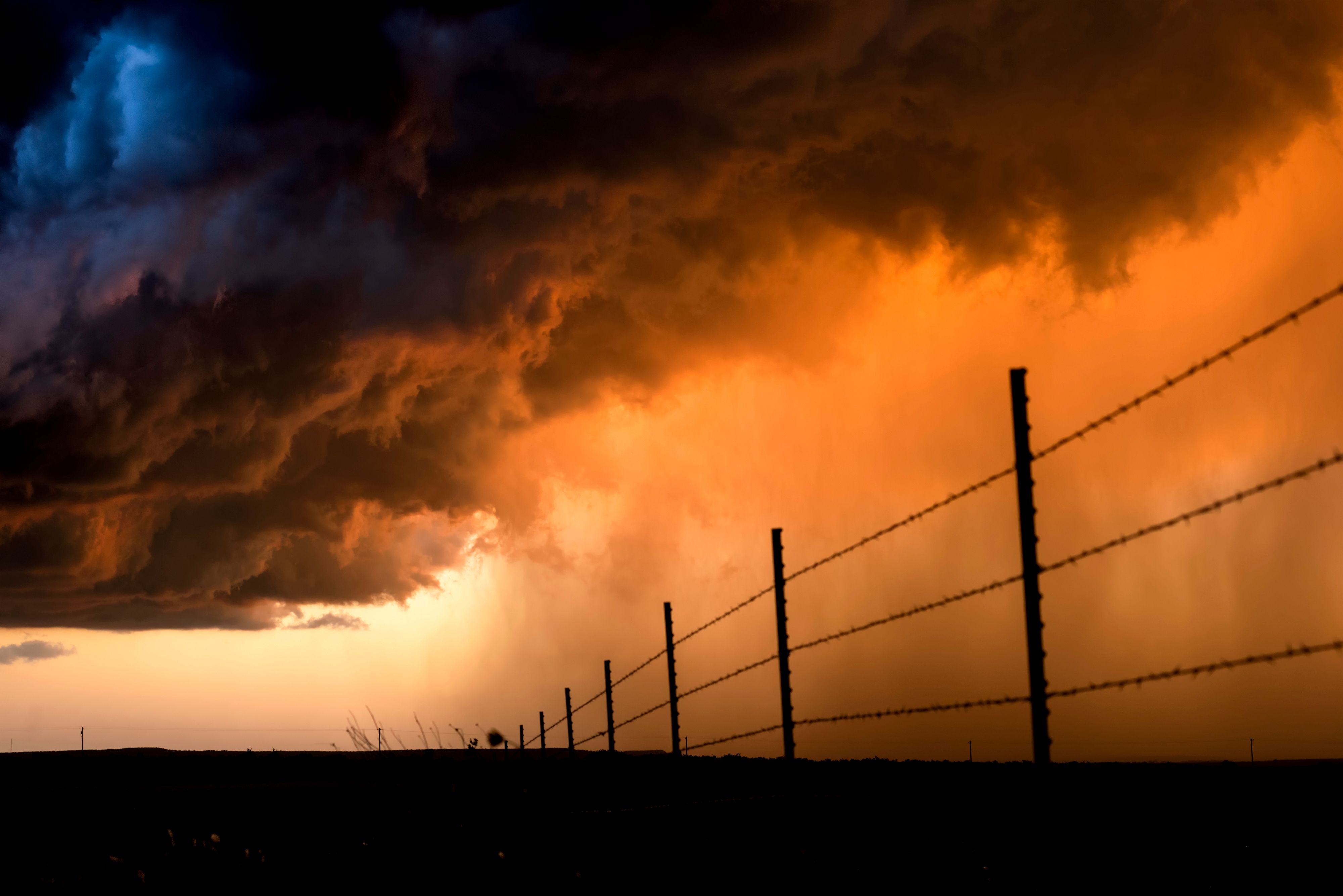 Pouring rain during a lightning storm in the Great Plains Tornado Alley, Roswell, New Mexico.