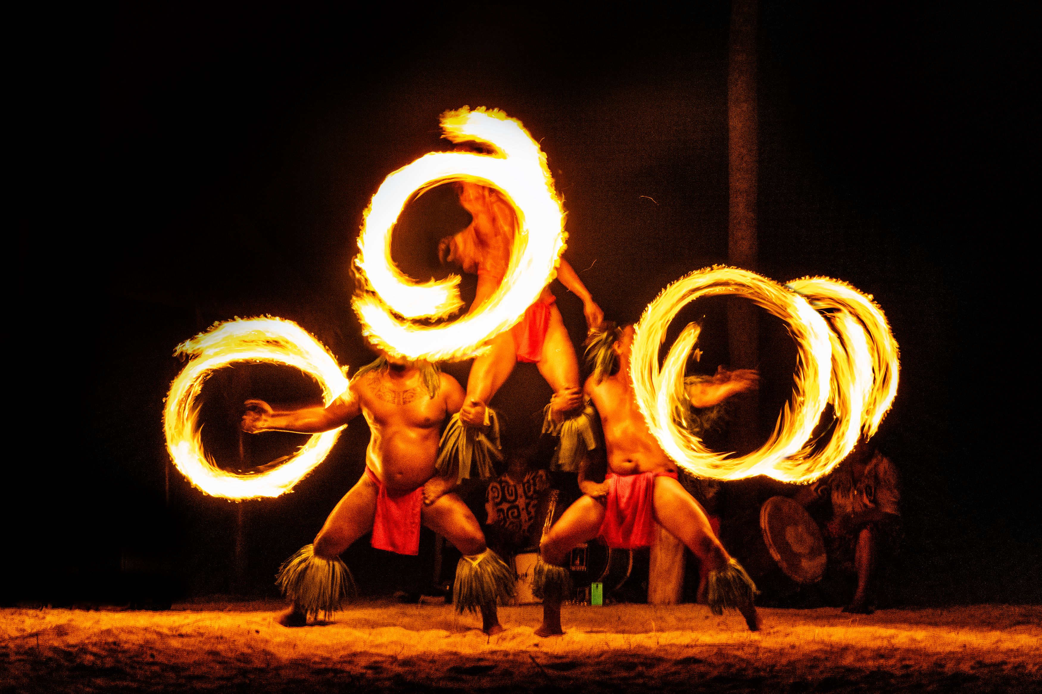 Luau hawaiian fire dancers in Hawaii or French Polynesia, traditional polynesian dance