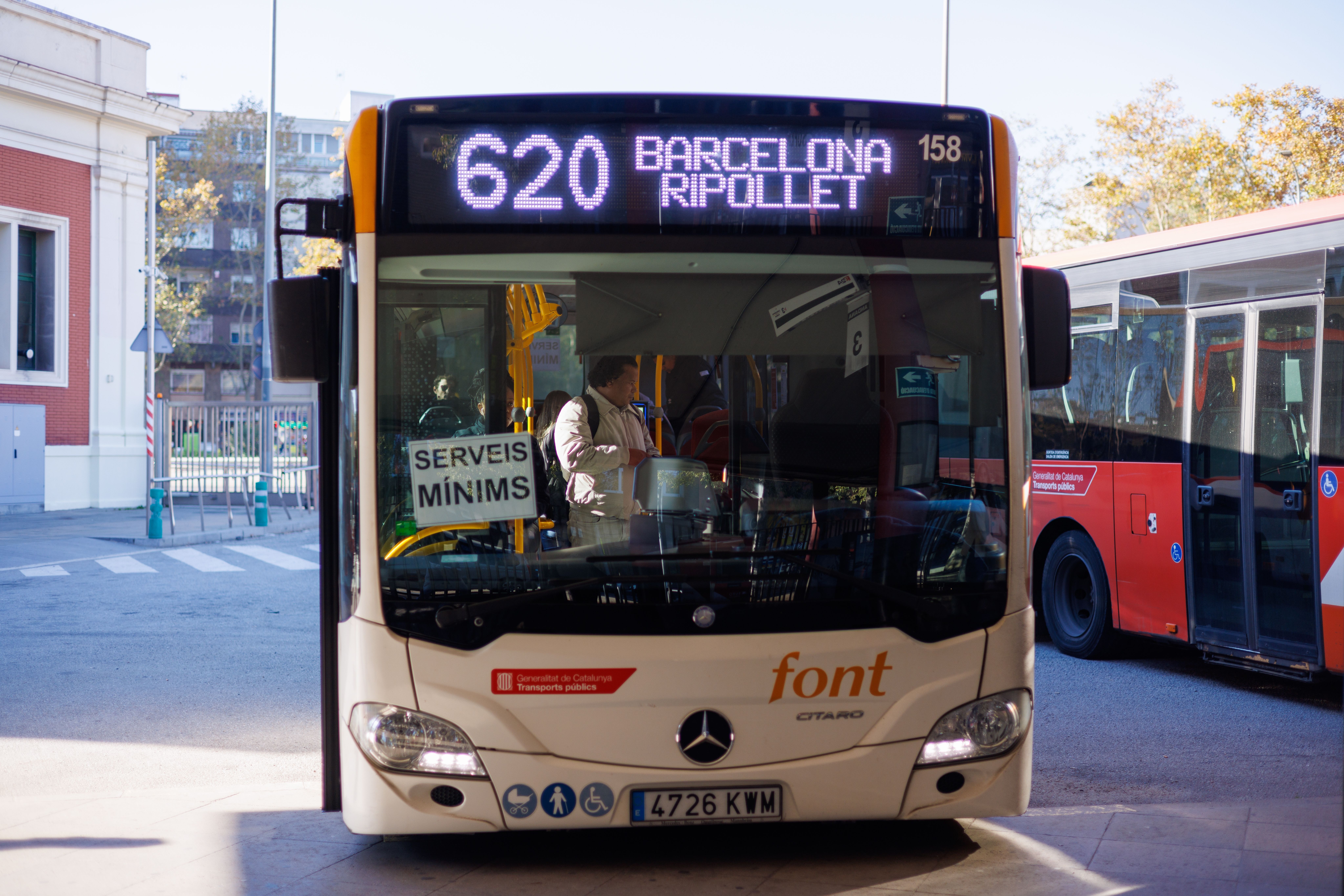 Barcelona-Spain, November 28, 2024. A public bus with a minimum service sign continues to operate amid a strike, ensuring limited city transport