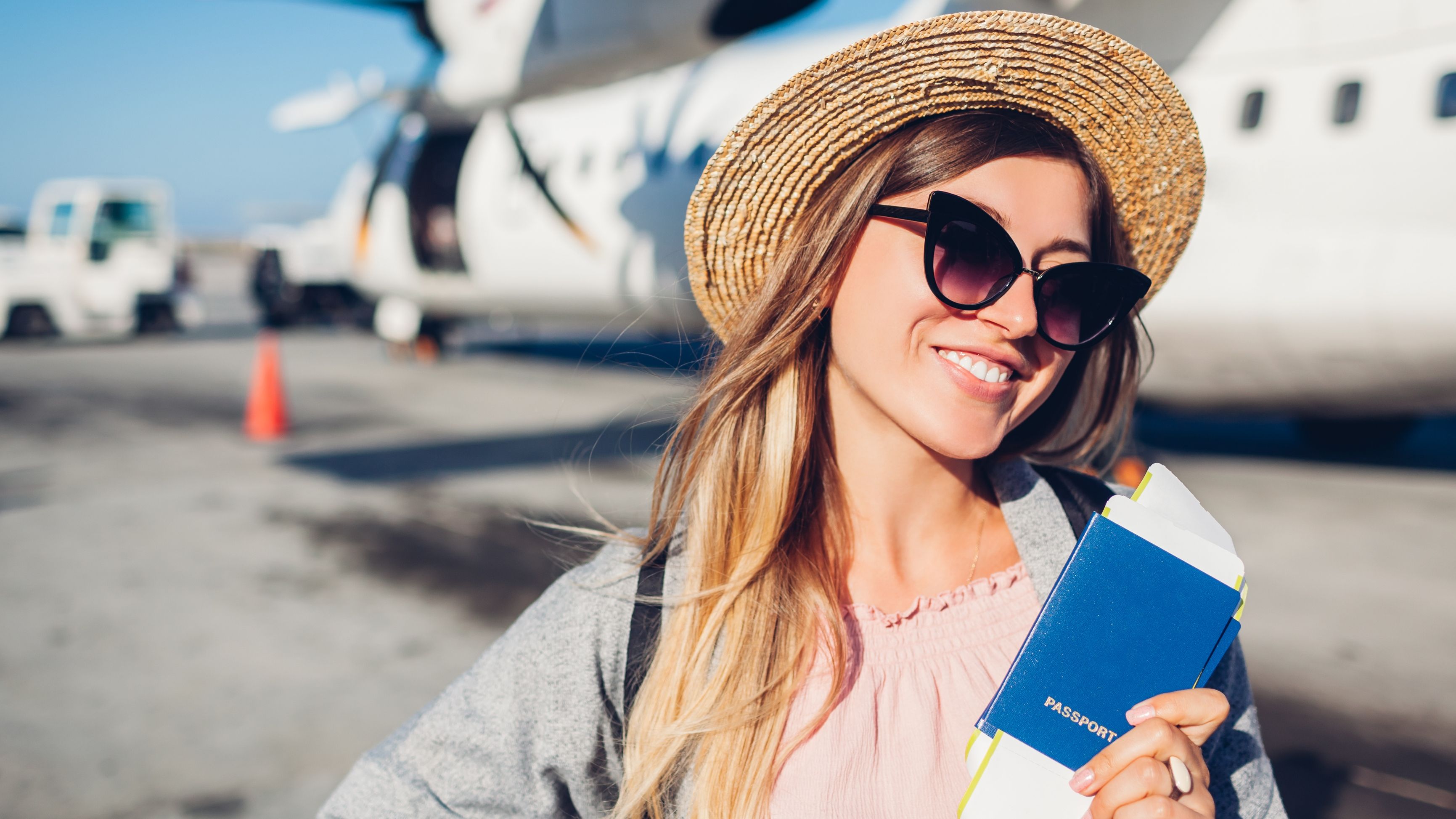 Person holding up a passport