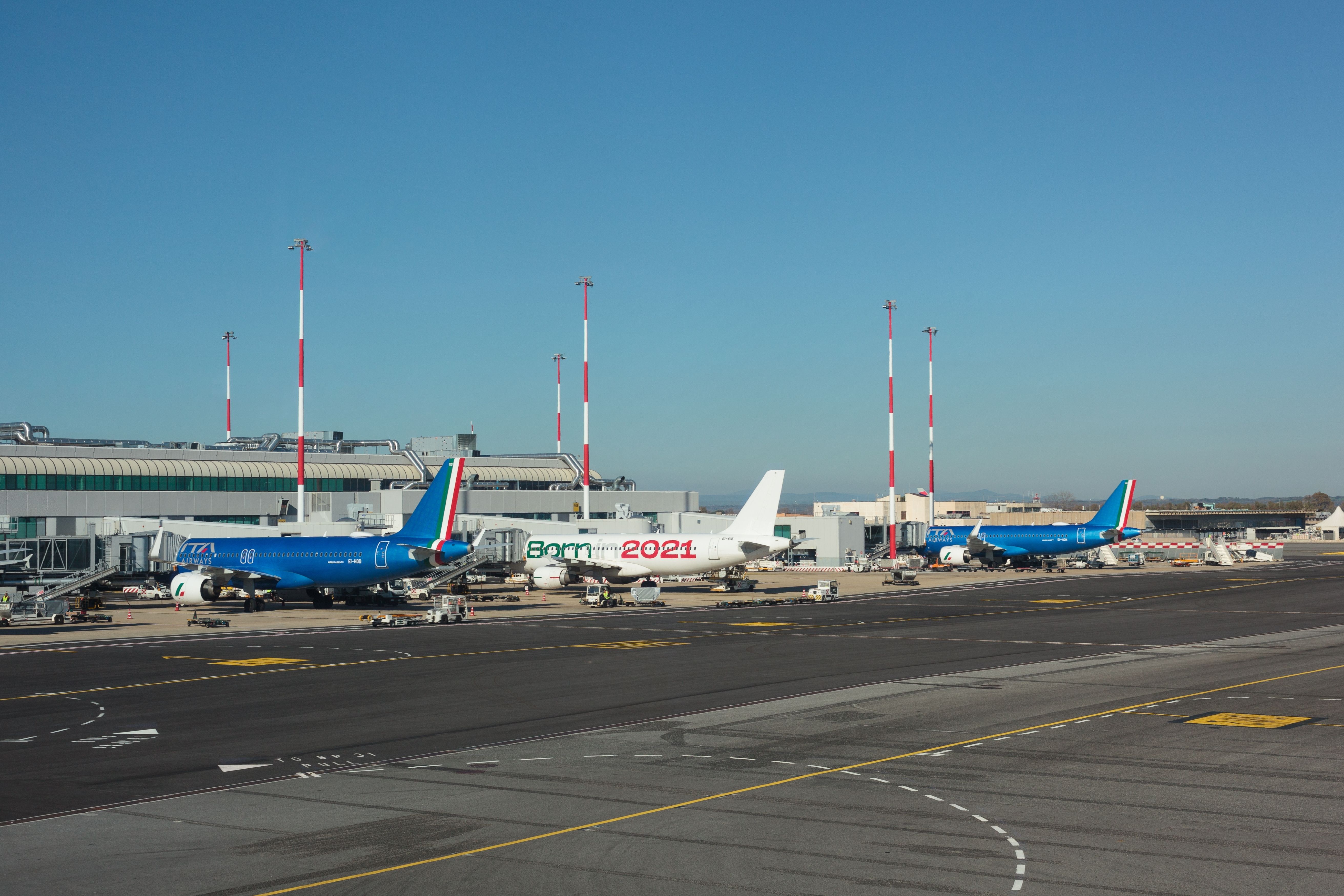 Rome, Italy - January 13, 2024 Ita Airways aircrafts docking at Fiumicino International Airport Leonardo da Vinci