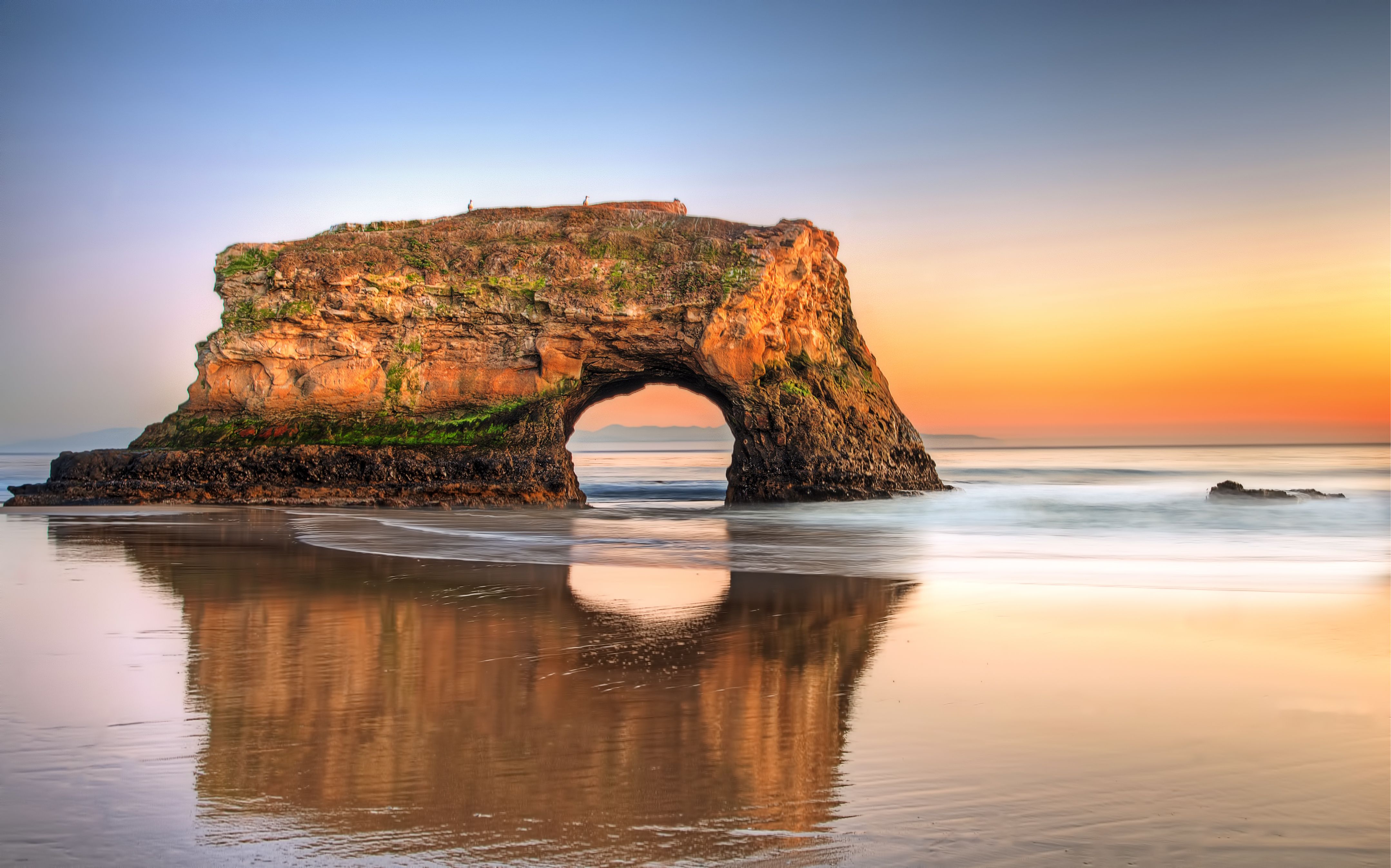 Sunset at Natural Bridges State Beach, California