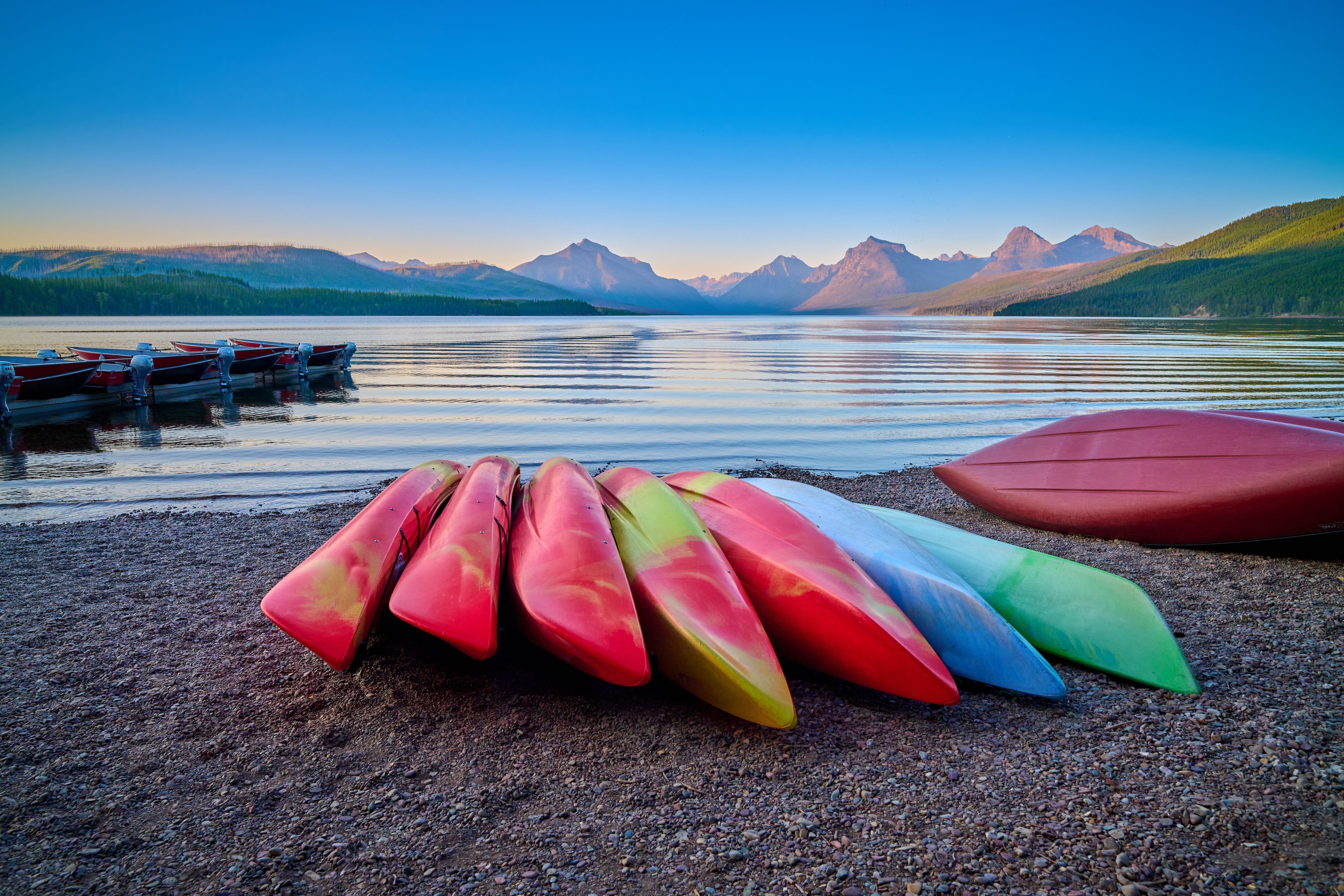 Kayaks along the shore of Lake McDonald, Glacier National Park