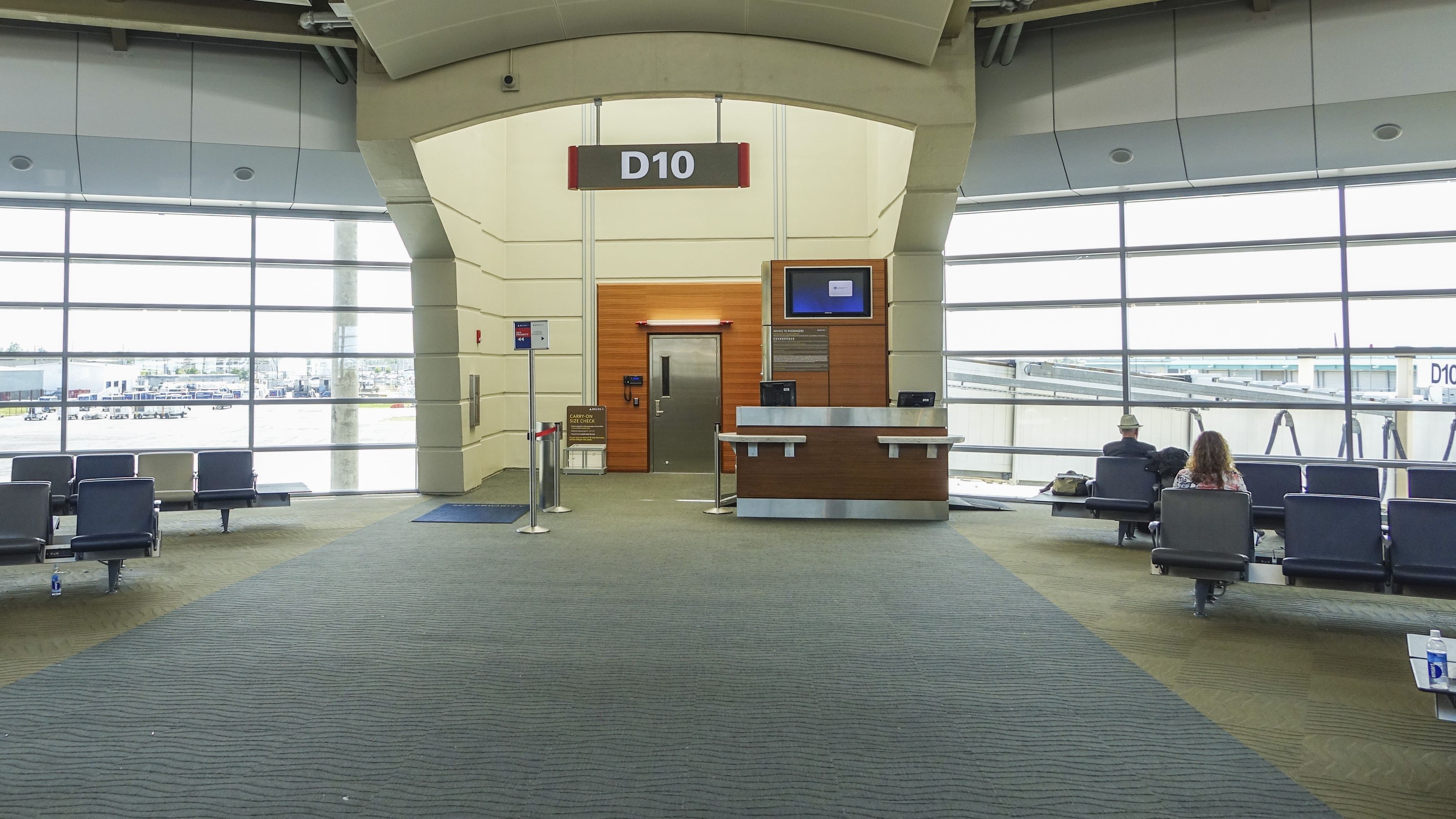 Empty US airport Canadian Cross-Border Travel Plummets as Political Tensions Mount