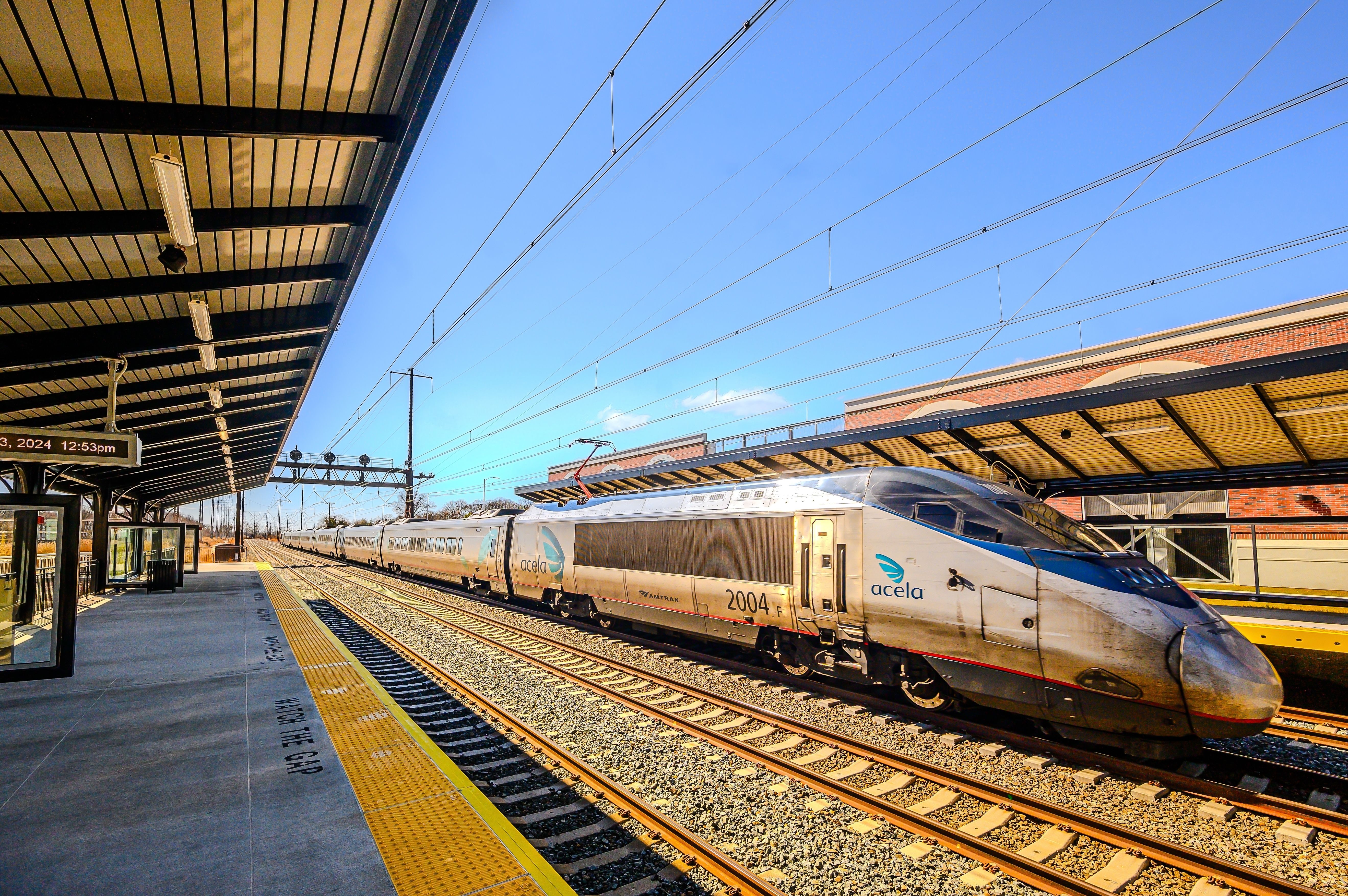 An attractive Amtrak Acela train to the station.