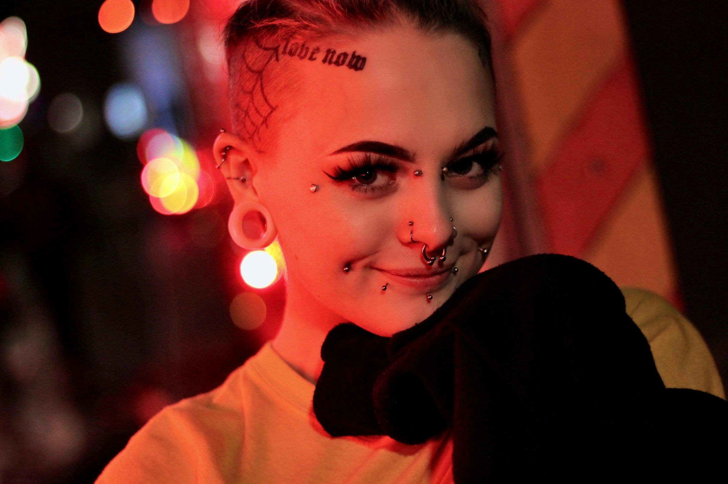 Person in Netherlands with multiple facial piercings