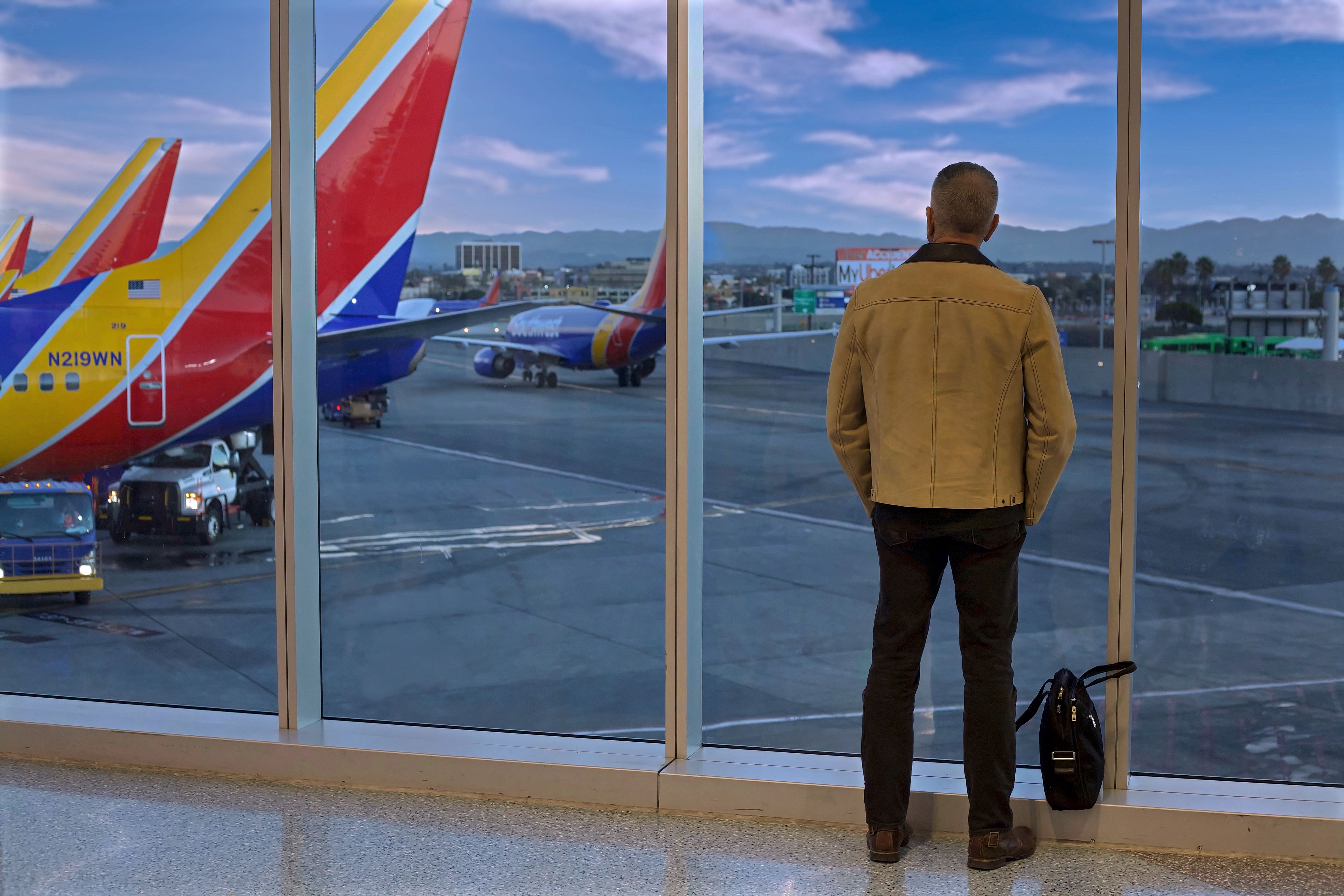Southwest airlines gets rid of free checked baggage but certain