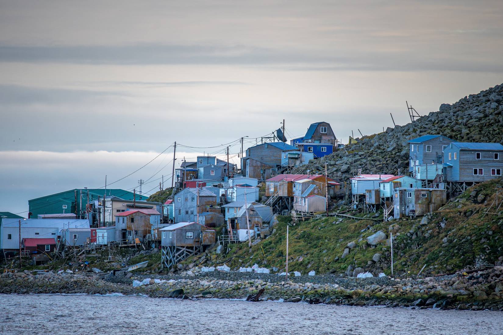 Little Diomede Island is an inhabited island of Alaska in the middle of the Bering Strait