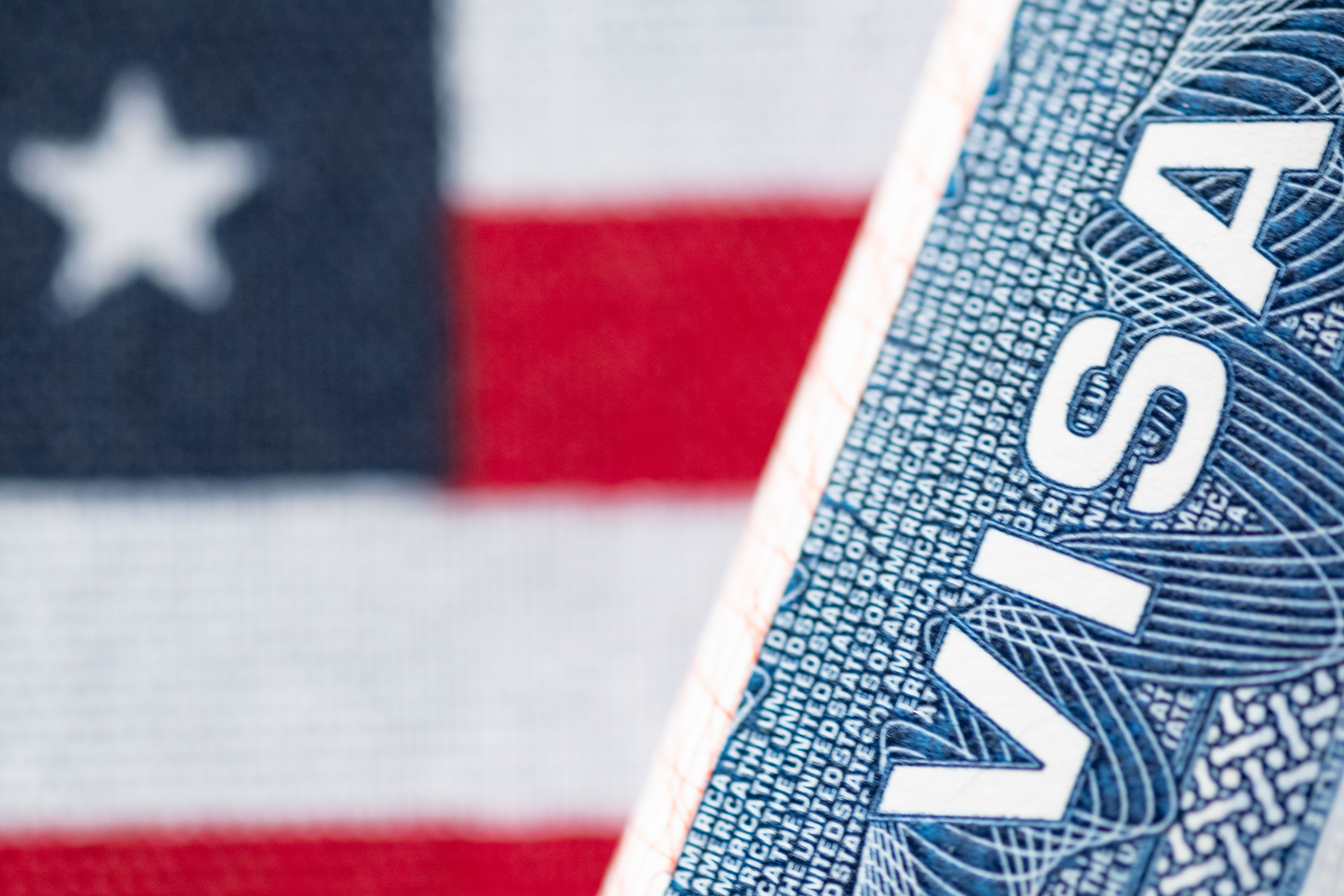 Visa to the United States and the US flag.