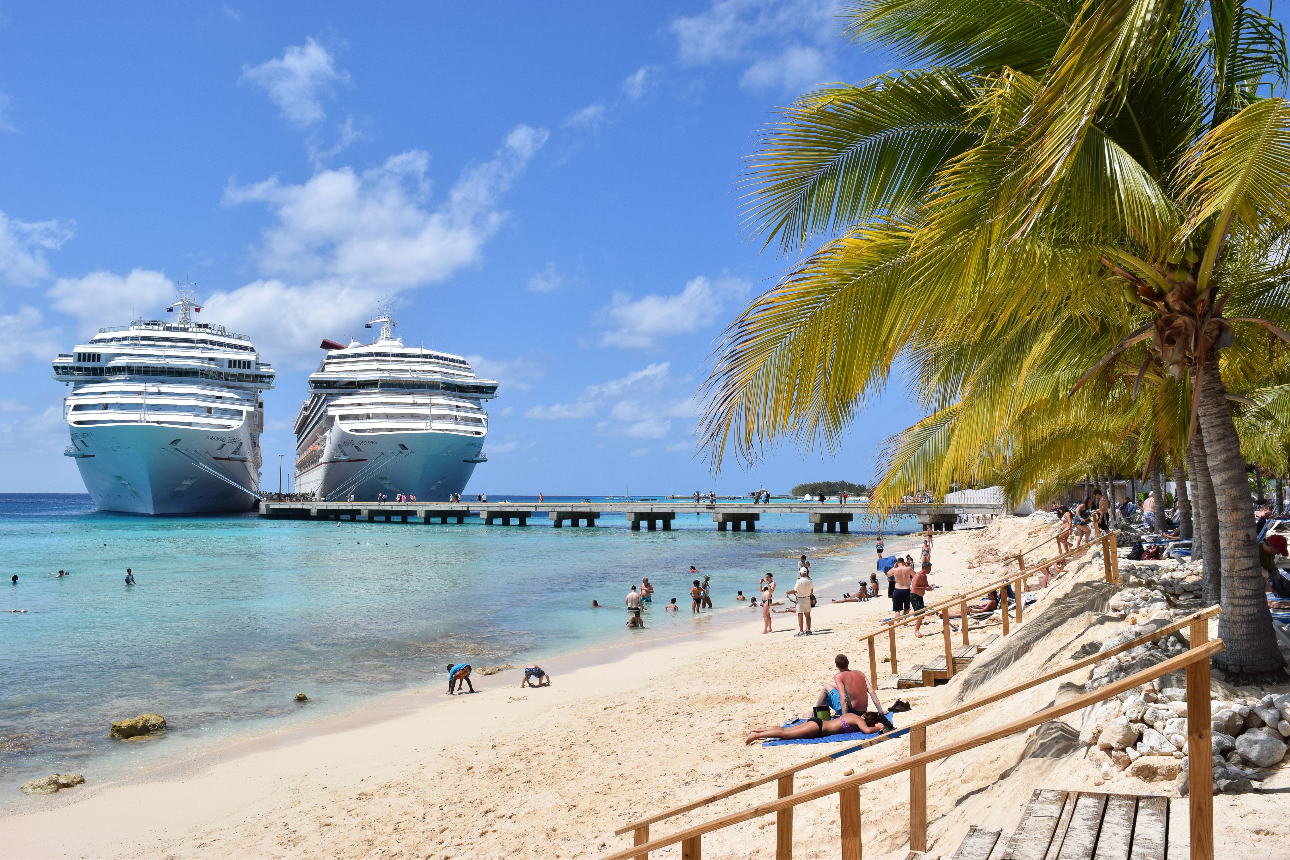 A view of Carnival Liberty and Victory Cruise Ships at SunRay Beach, Grand Turk, Turks and Caicos Islands