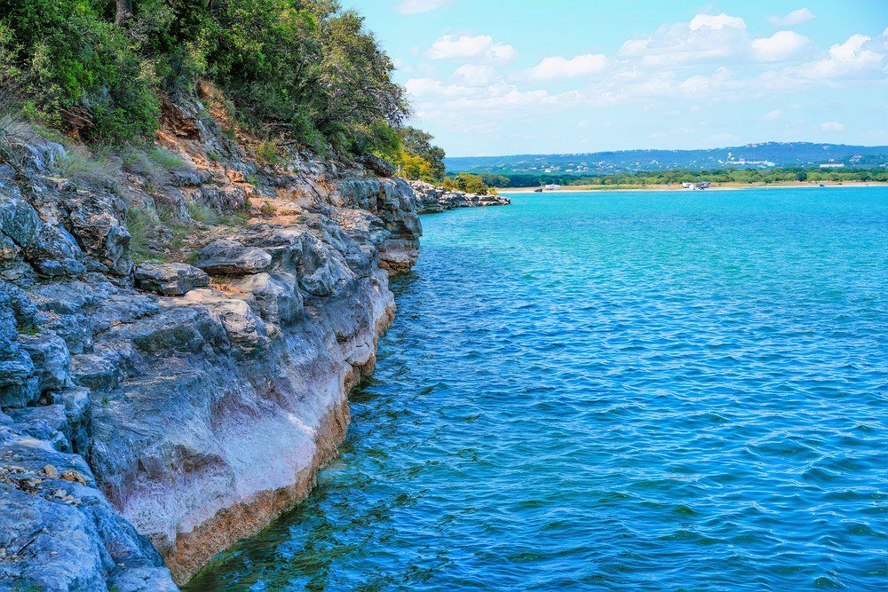 The stone wall that came out of the Lake Travis waters near Austin Texas