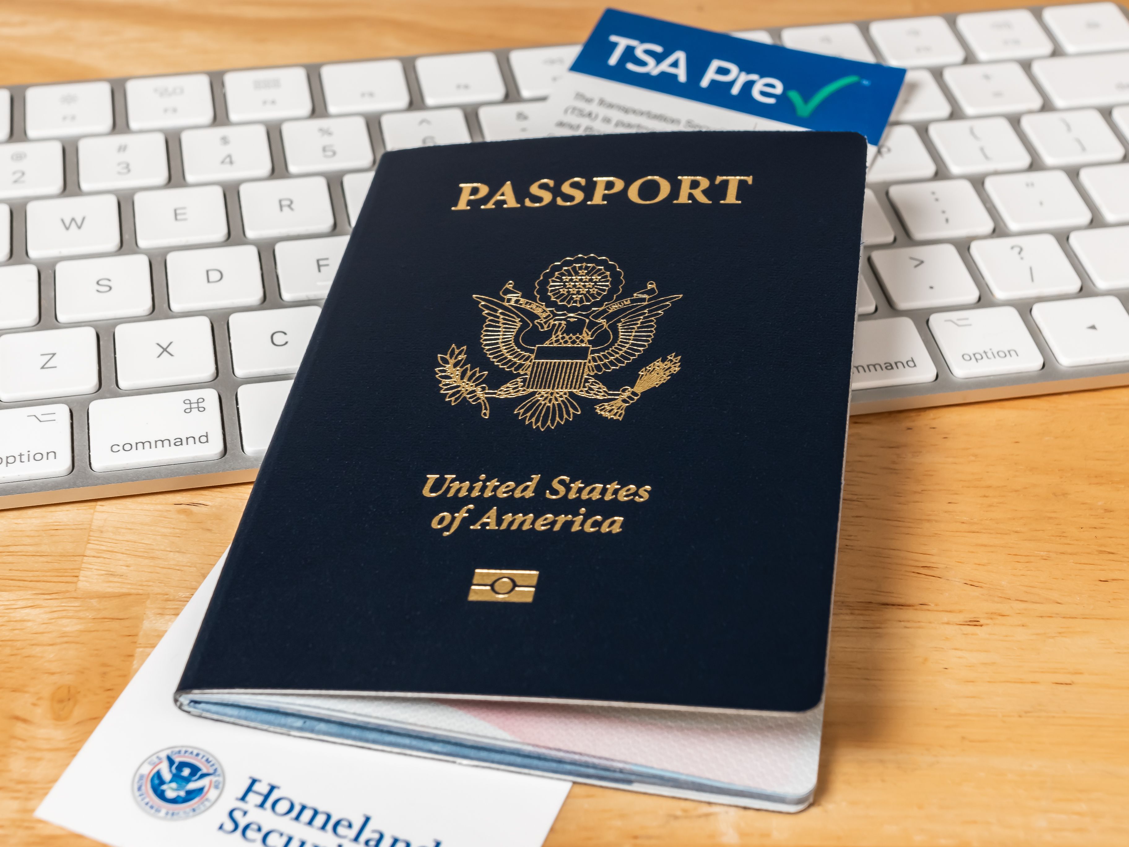 United States Passport with the TSA Homeland Security Department Pre -Checking Registration Information Card