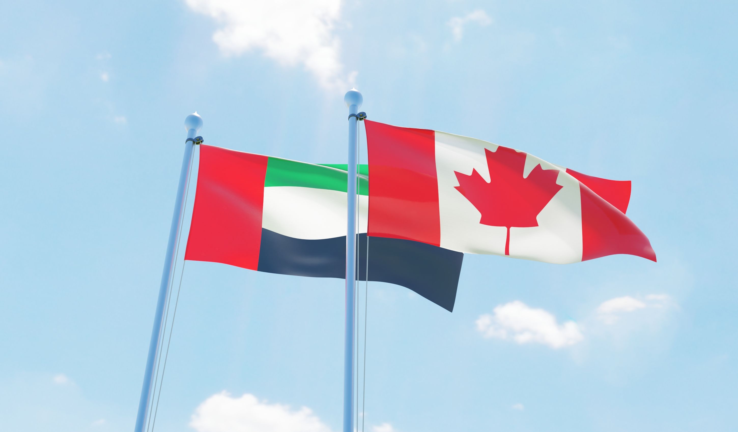 The flags of Canada and United Arab Emirates