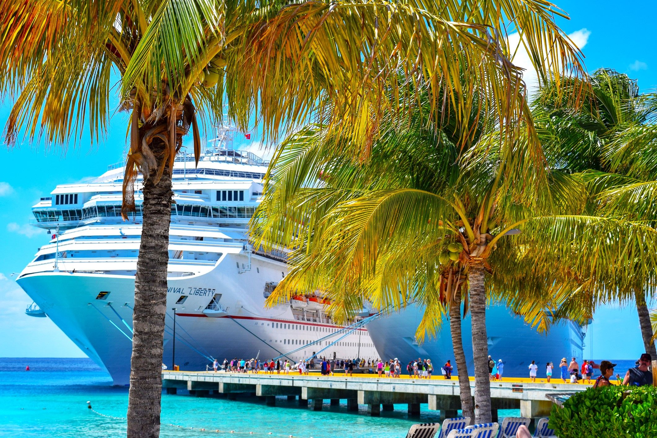 Carnival Cruise Line cruise ship guests disembarking at the pier at Cruise Center SunRay Beach, Grand Turk, Turks and Caicos Islands, Caribbean