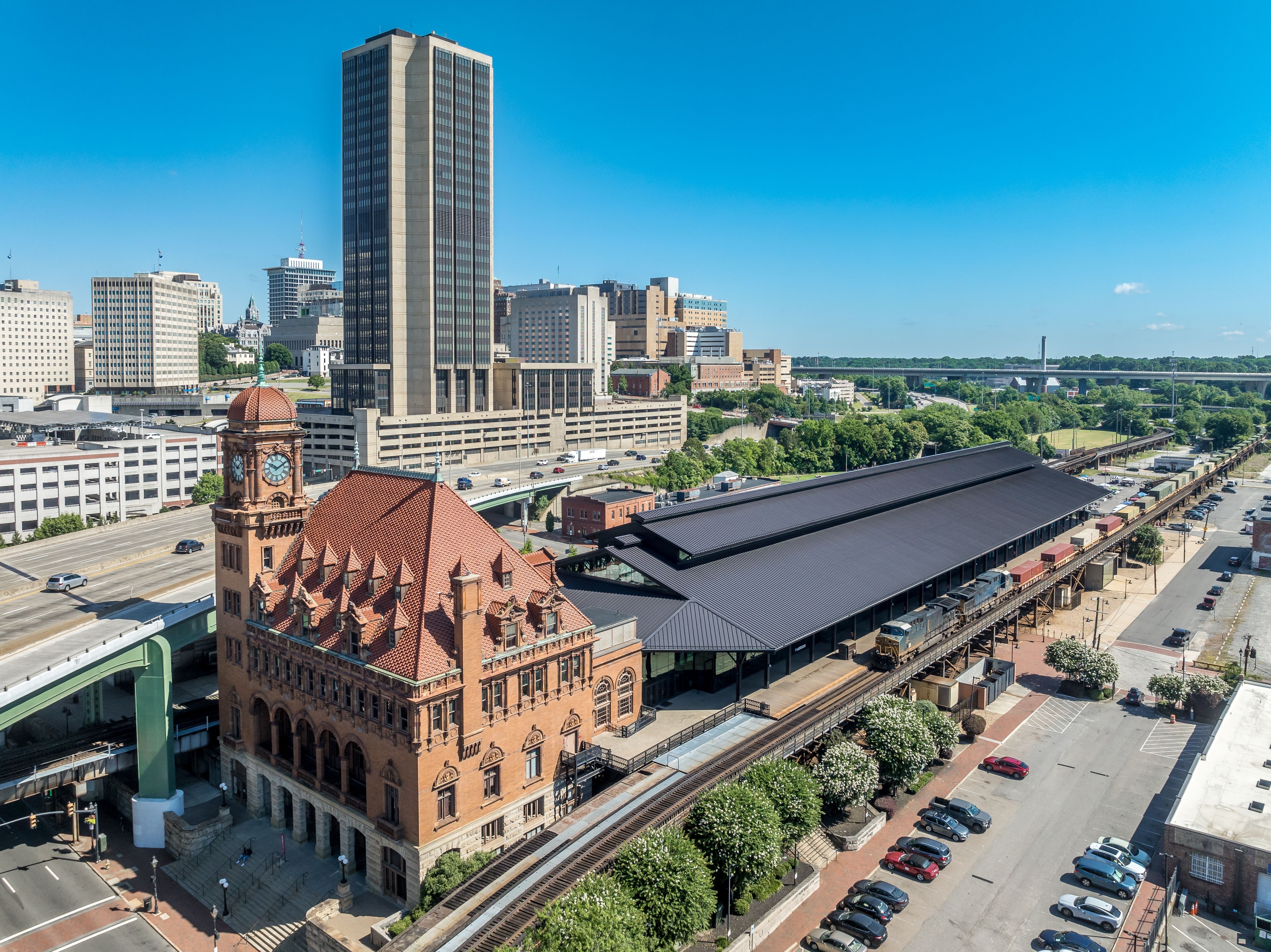 Aerial view of downtown Richmond with skyscrapers, historic Main Street train station
