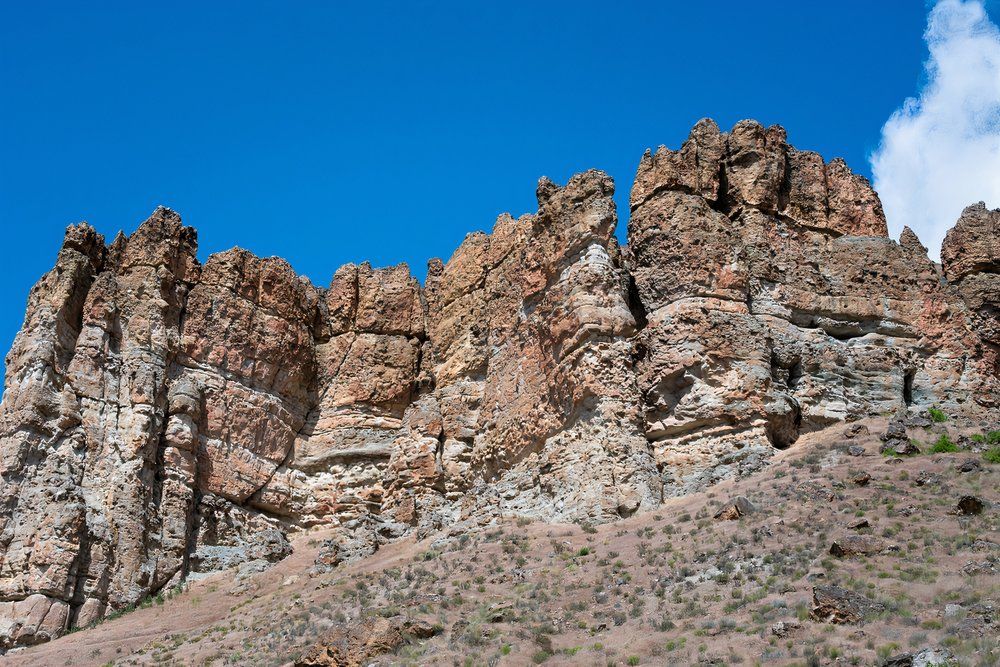 Majestic rocky cliffs landscape of the Clarno Palisades in John Day Fossil Beds National Monument, Clarno Unit, Oregon