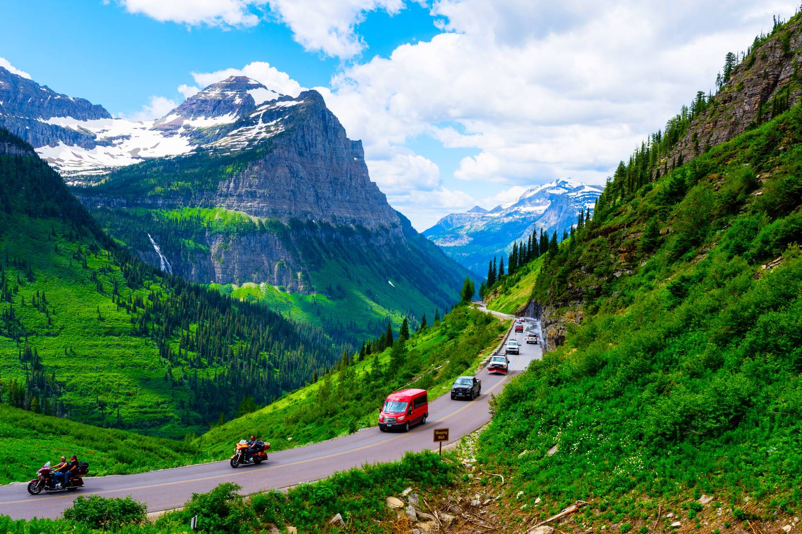 Cars driving the Going-to-the-Sun road in Glacier National Park, Montana, MT, USA