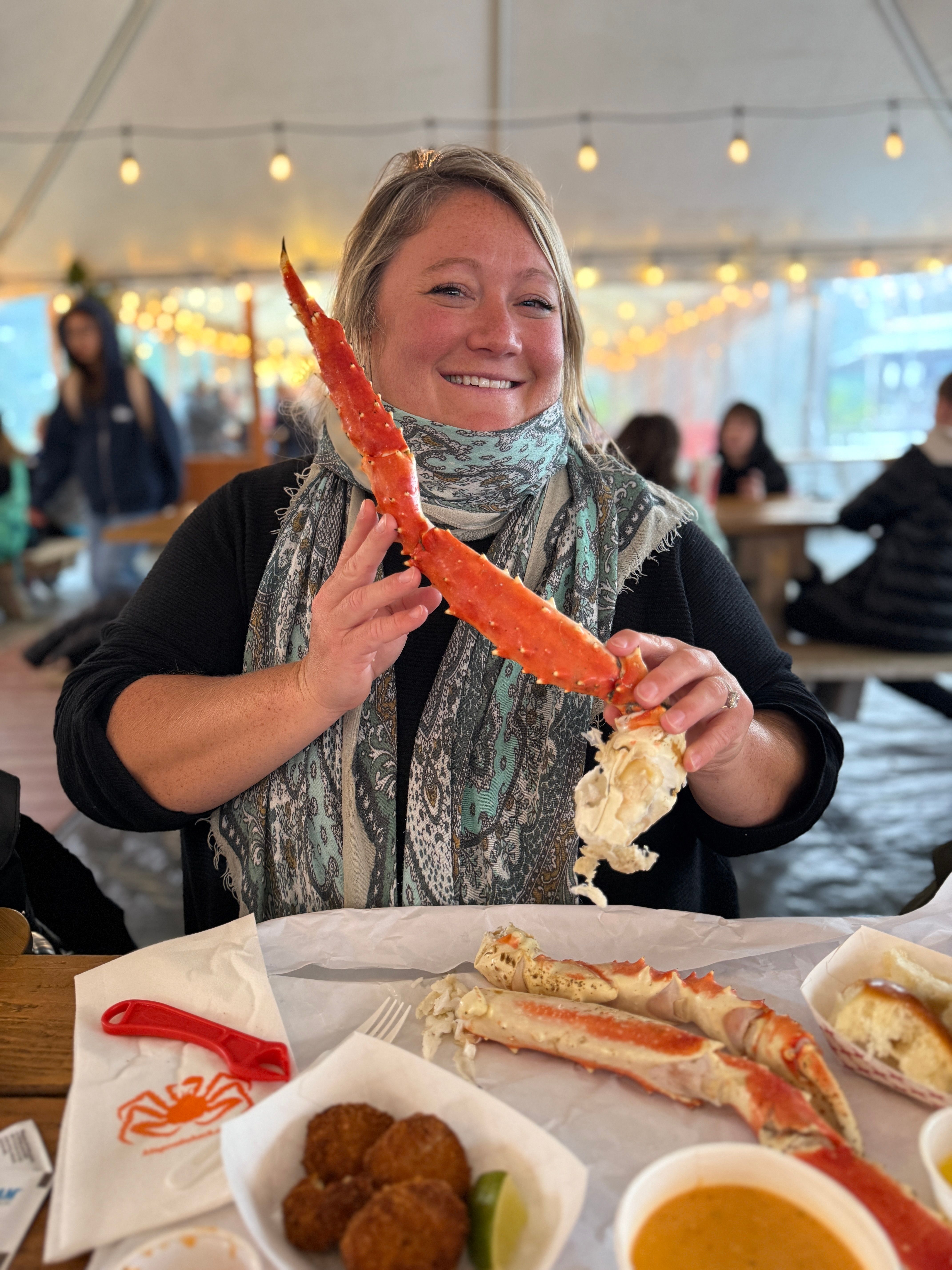 Writer eats crab legs at Tracy's King Crab Shack