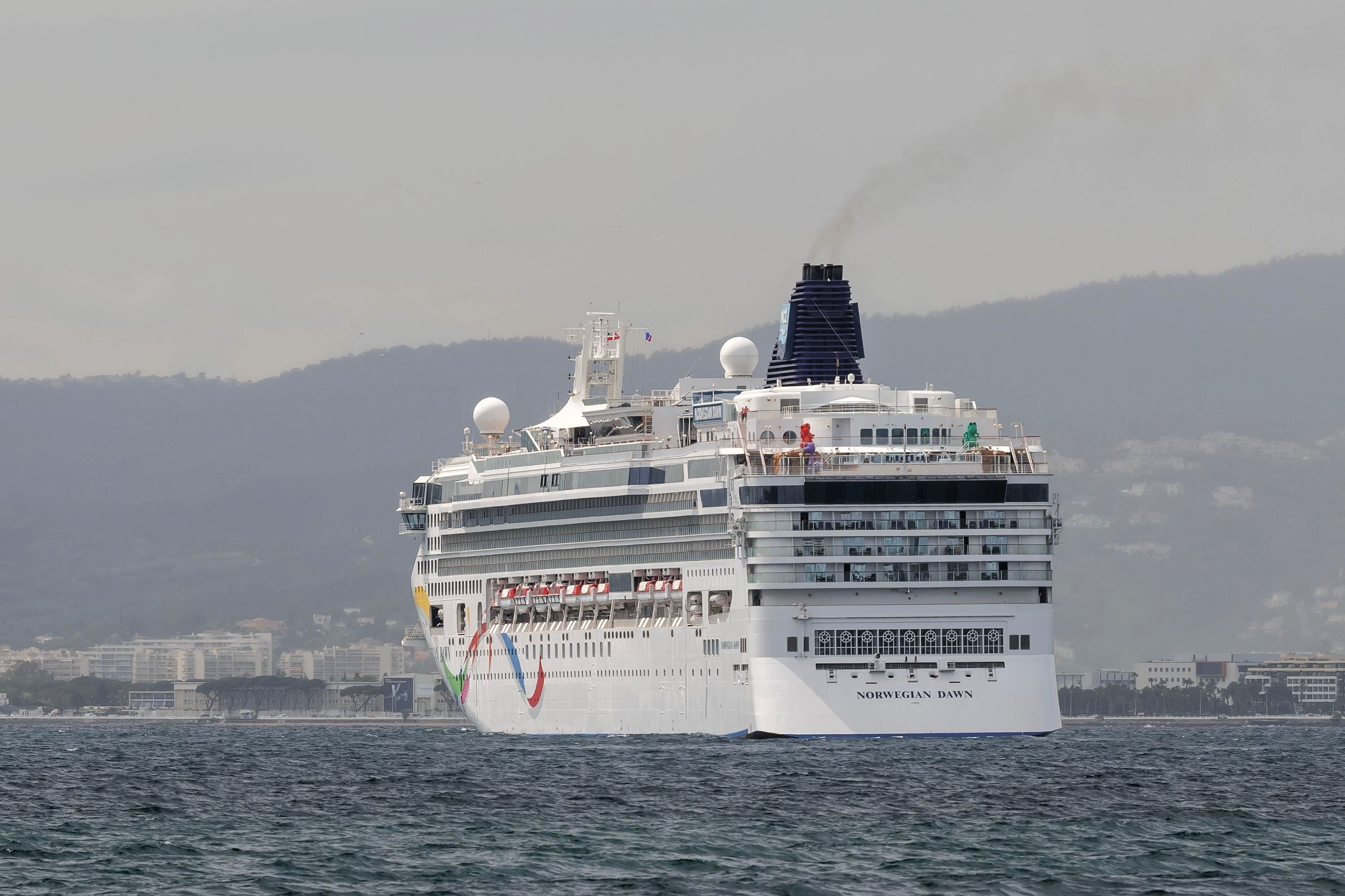 View on the cruise ship NORWEGIAN DAWN anchored in the Gulf of La Napoule for a cruise stopover