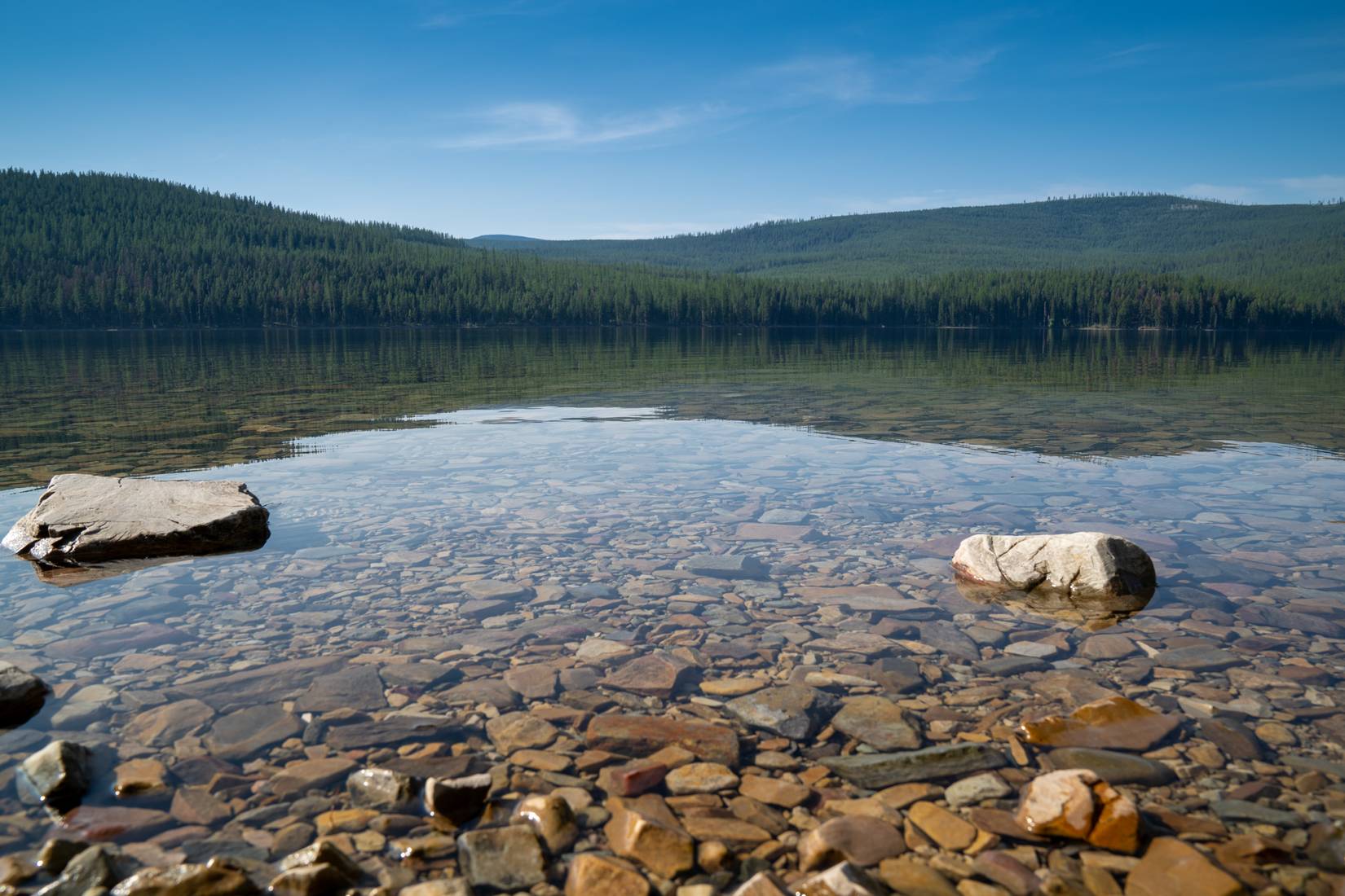 Rocky area beach of the Thompson Chain of Lakes area in Montana
